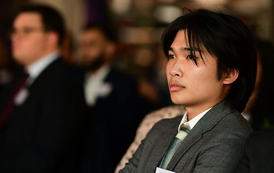 A young solicitor attends a Law Society conference.