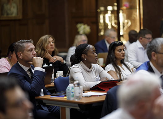 Law Society Council members attend a meeting at the Law Society in London.