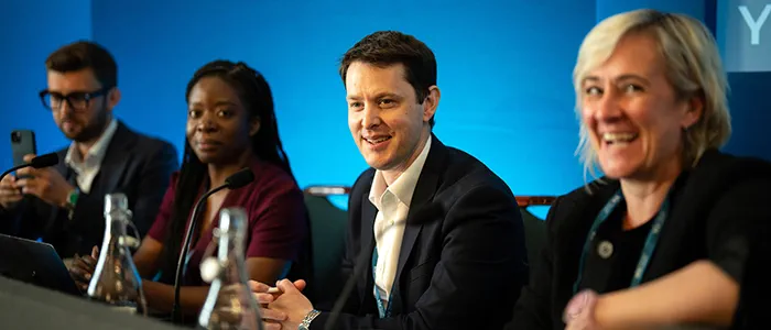 A panel of smiling speakers at the Law Society Private Client Conference.