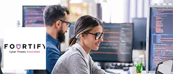 Software engineers analysing code, Fourtify's logo in the bottom left corner