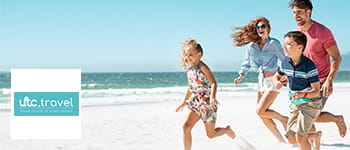 utc.travel logo overlayed on an image of a family running along a white sandy beach. There are two parents and two children.
