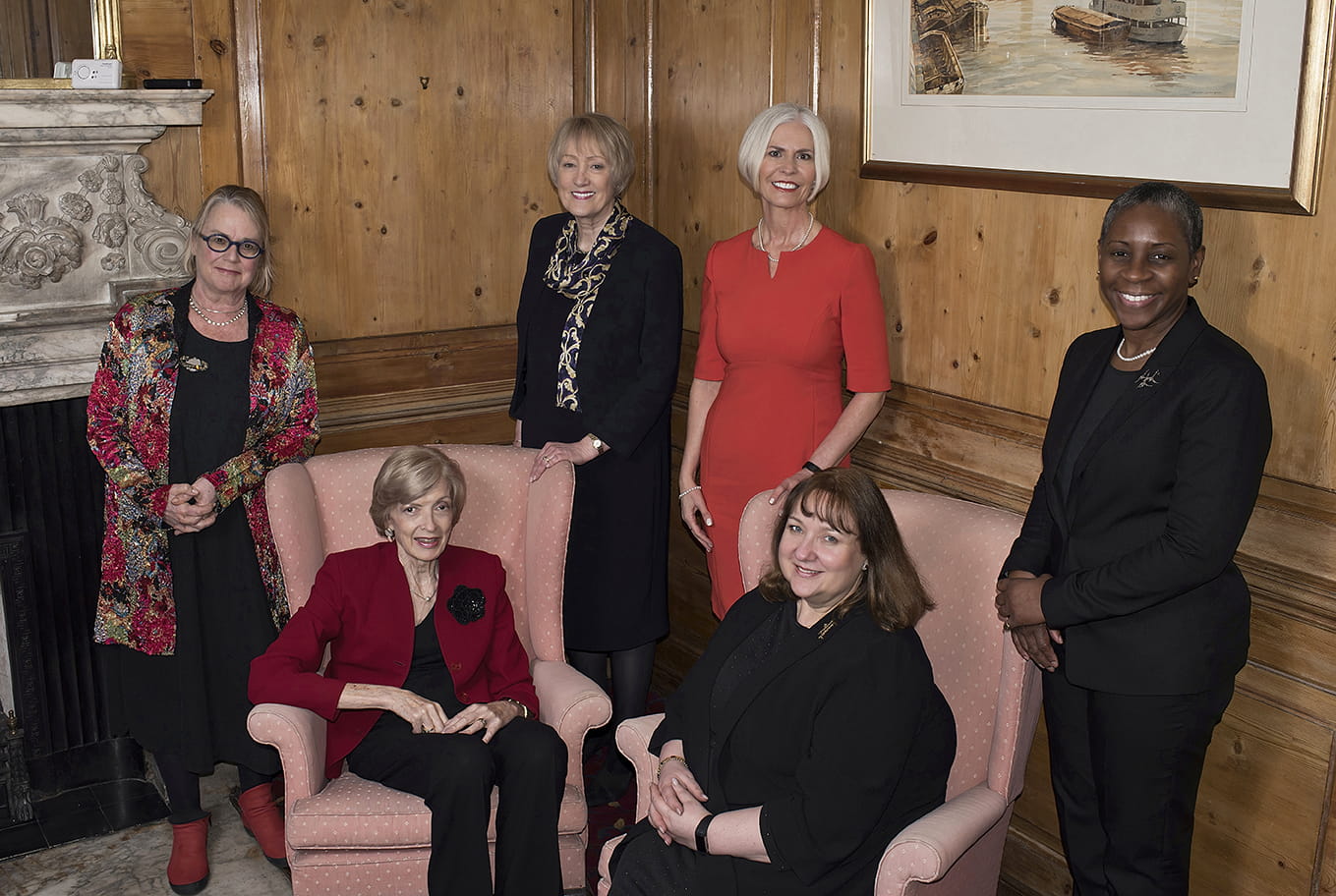 A group of six people in a room.