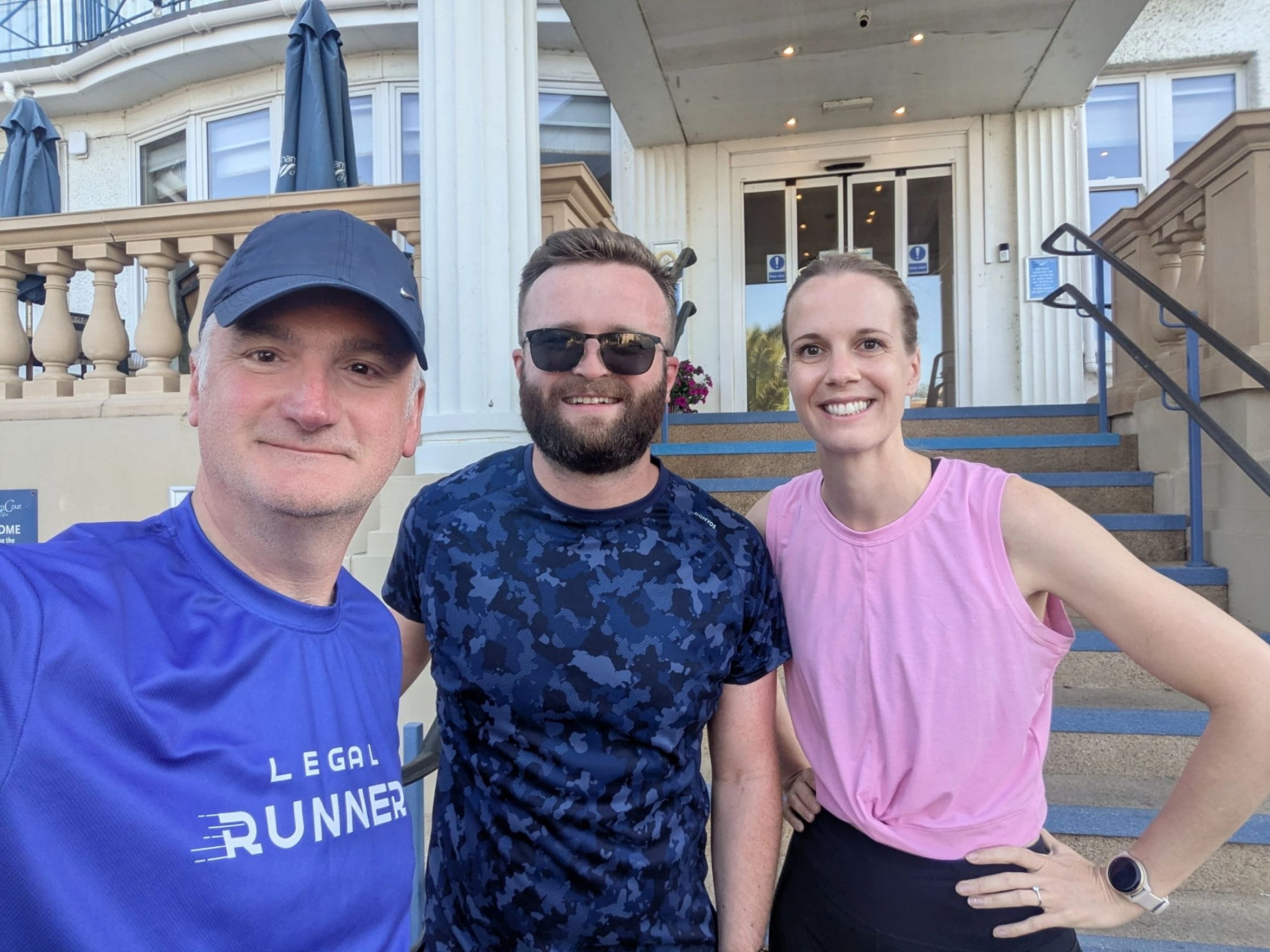 Mark (left) takes a selfie with fellow LegalRunners, Phil (middle) and Kate (right) during a trip to Bournemouth.