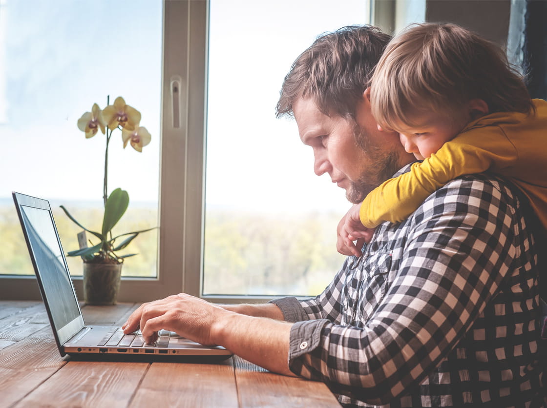 Man working from home with child