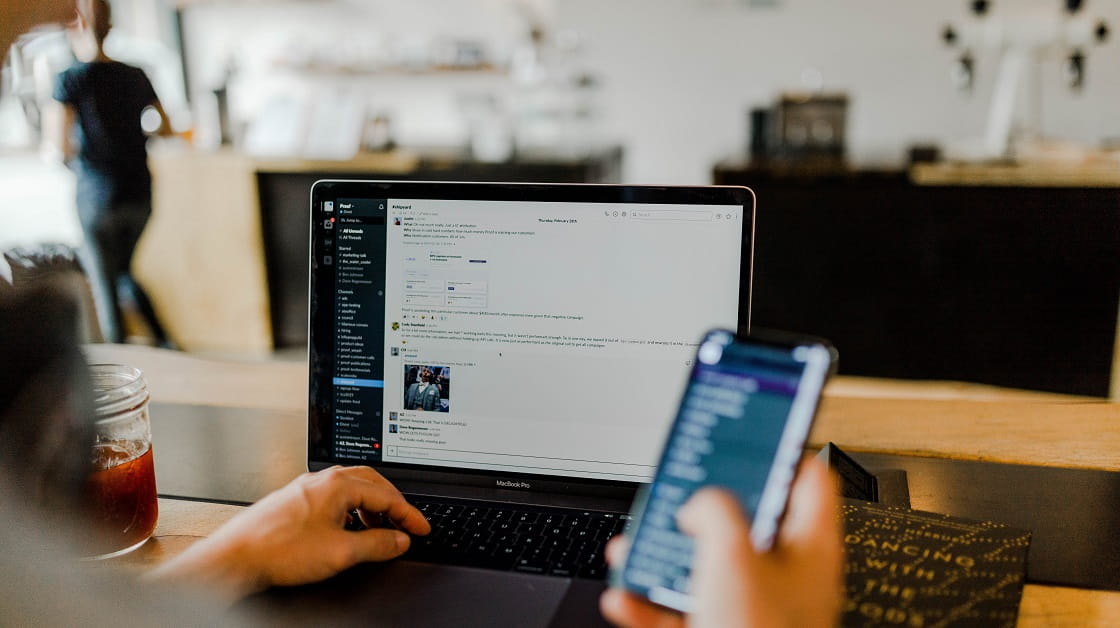 Using a laptop and mobile phone