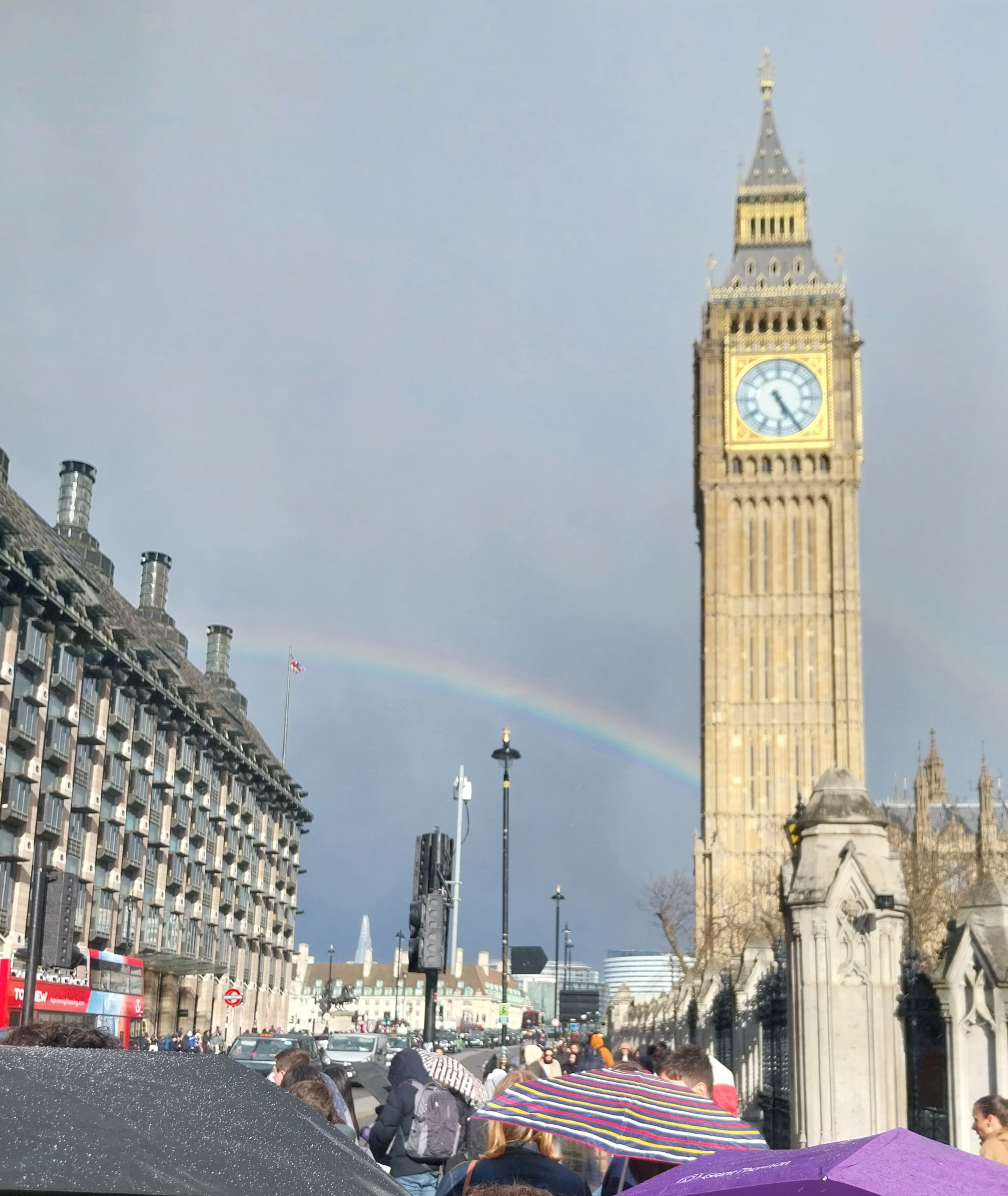 The Big Ben clock and a rainbow.