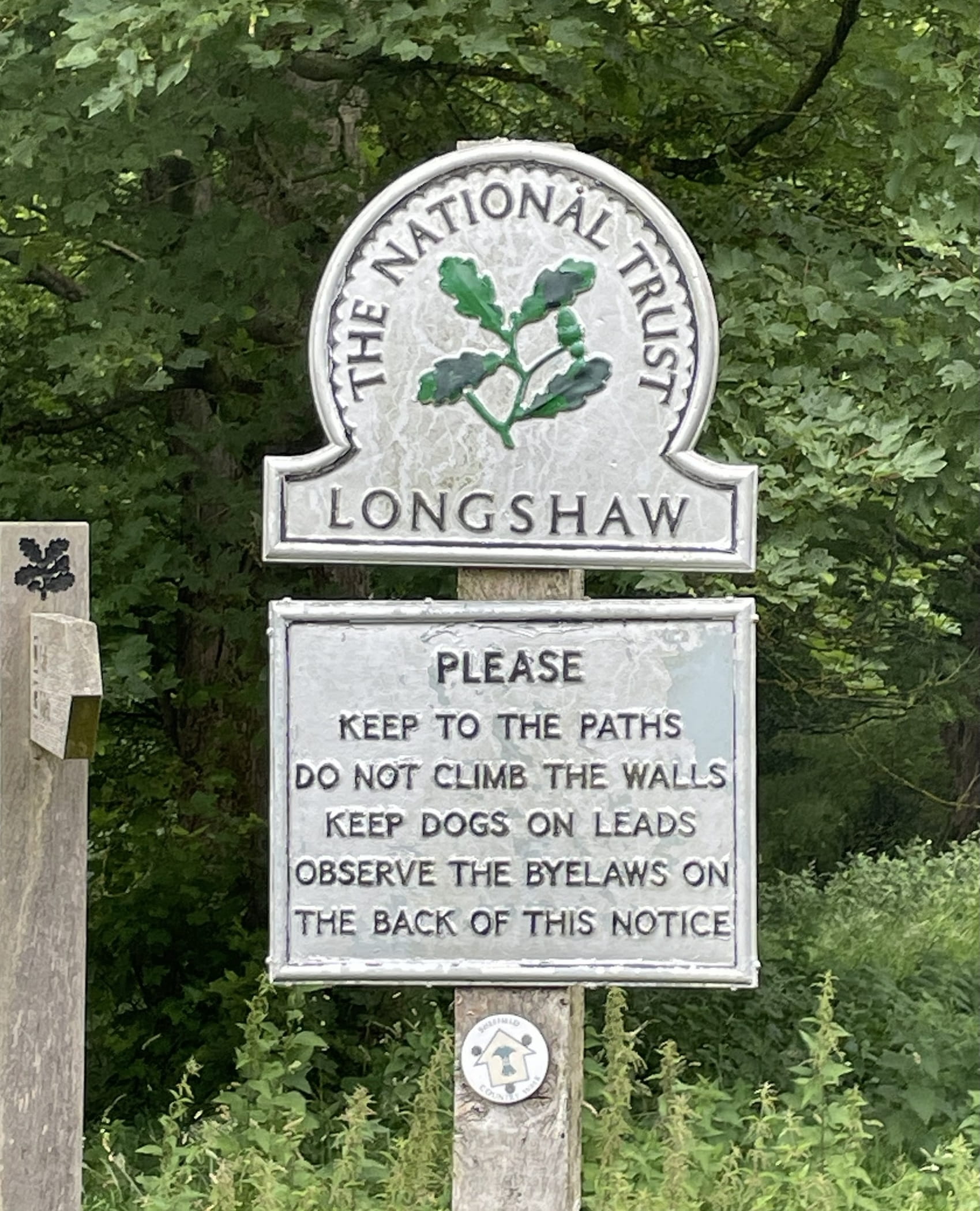 A sign in a National Trust wood.