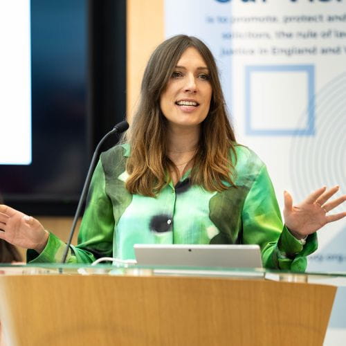 Carla Hoppe gives a presentation.