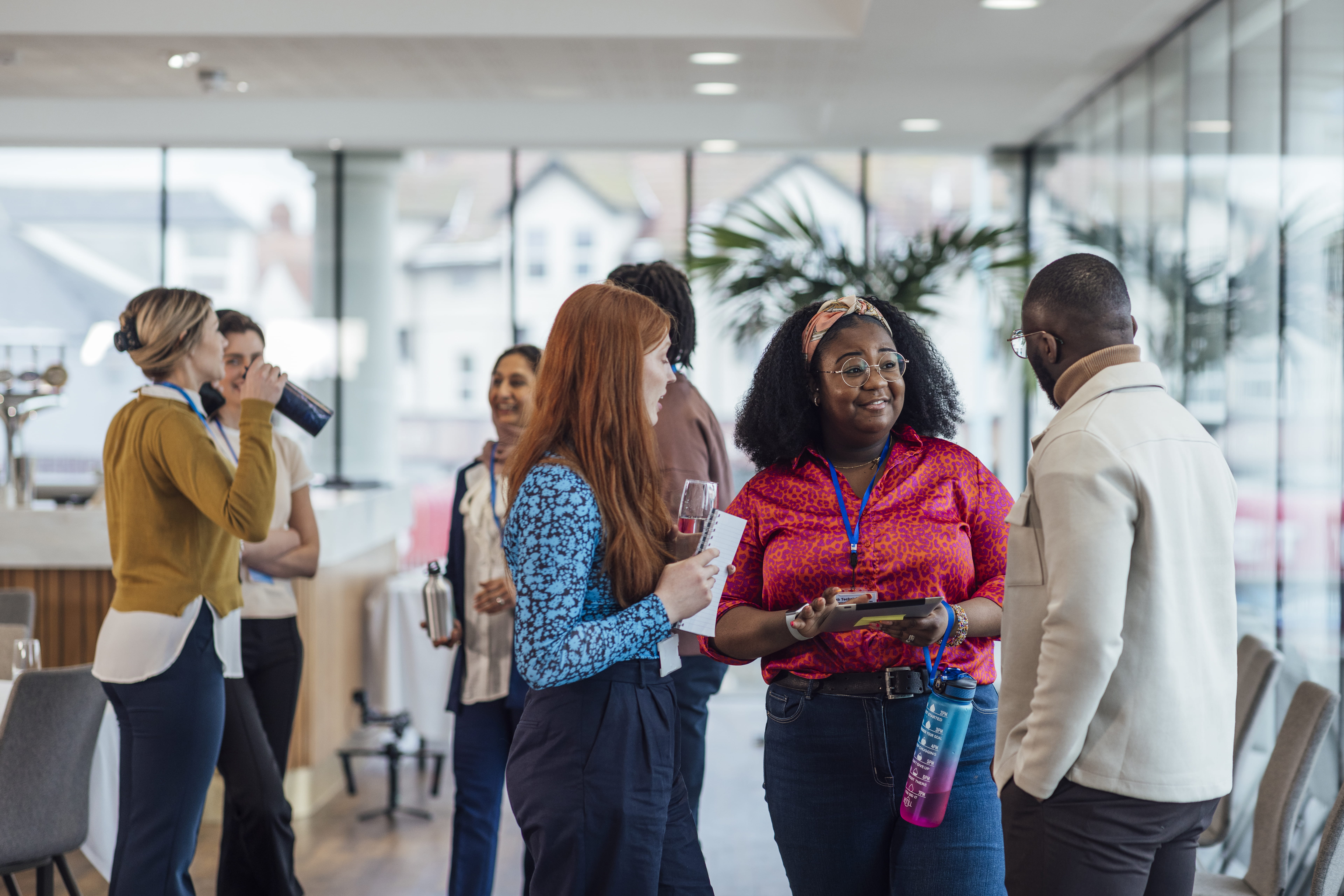A group of young professionals networking at an event.