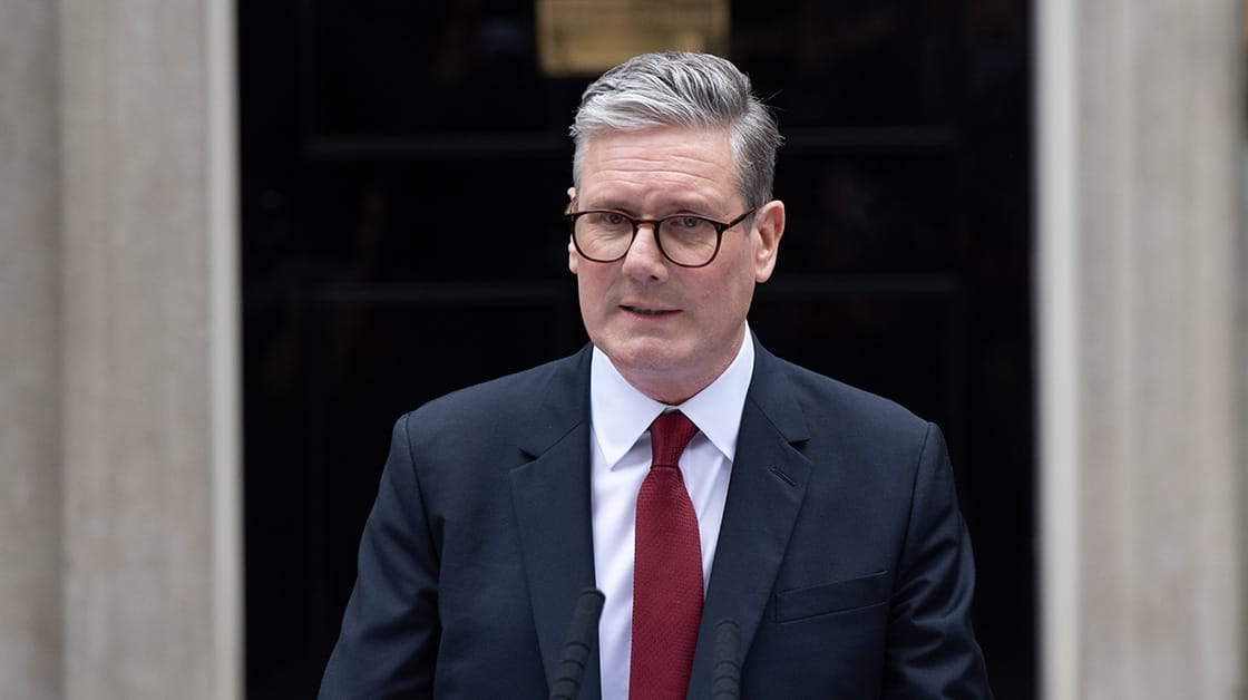 Prime minister Sir Keir Starmer stands outside Number 10 Downing Street, London.