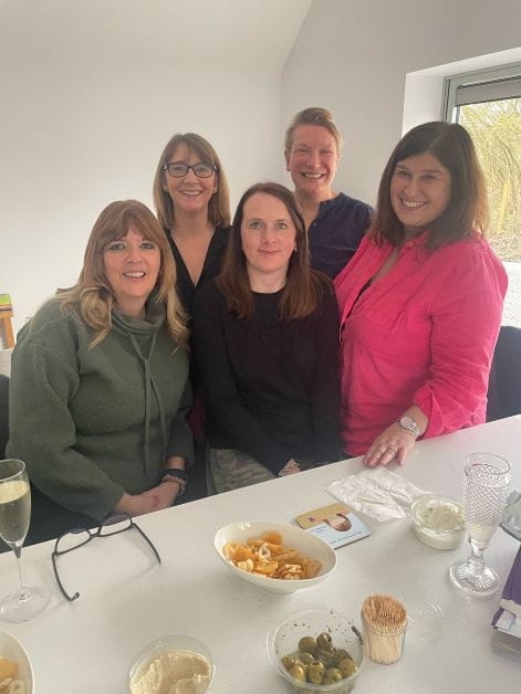 Sarah Dwight stands with four other women from her conveyancers support group