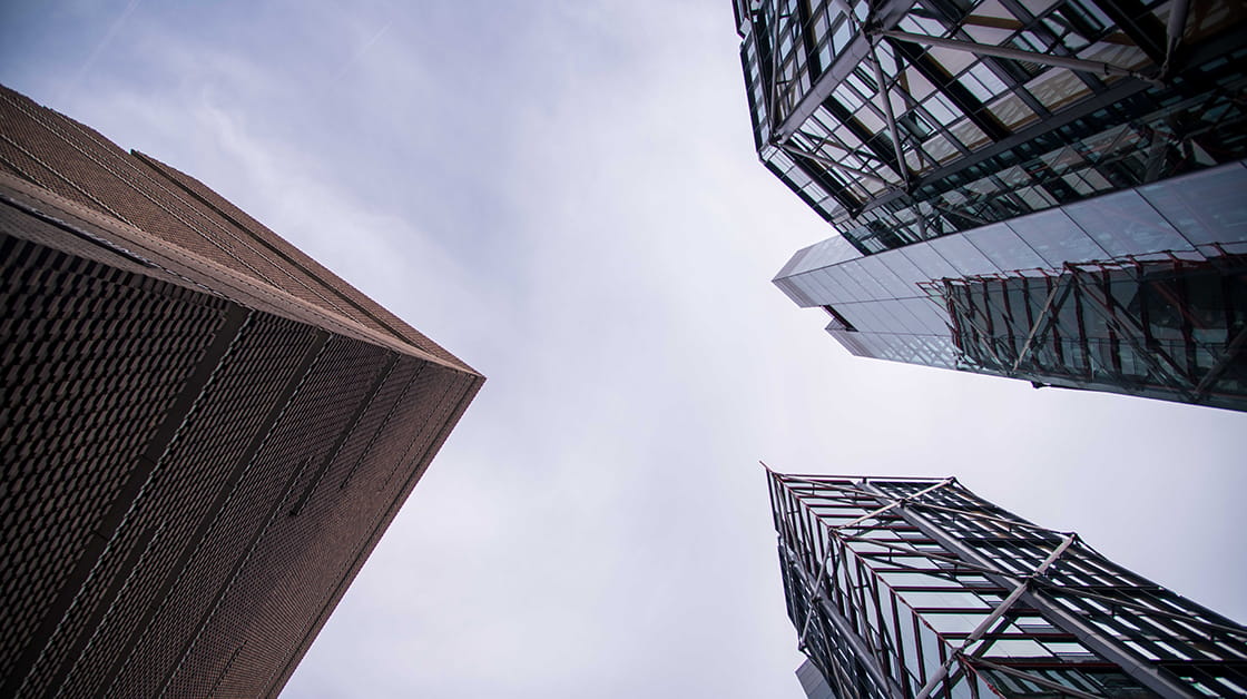 A view from the ground looking up at the Tate Modern Blavatnik Building and the Neo Bankside flats.