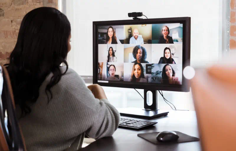 A woman attends a video call
